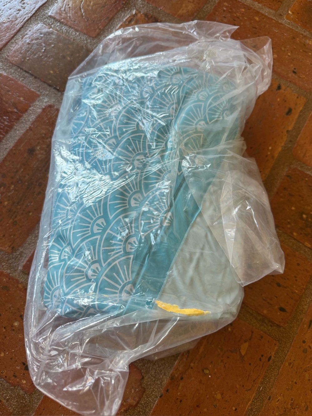 Light blue swimming pool approximately 7 ft by 2ft deep